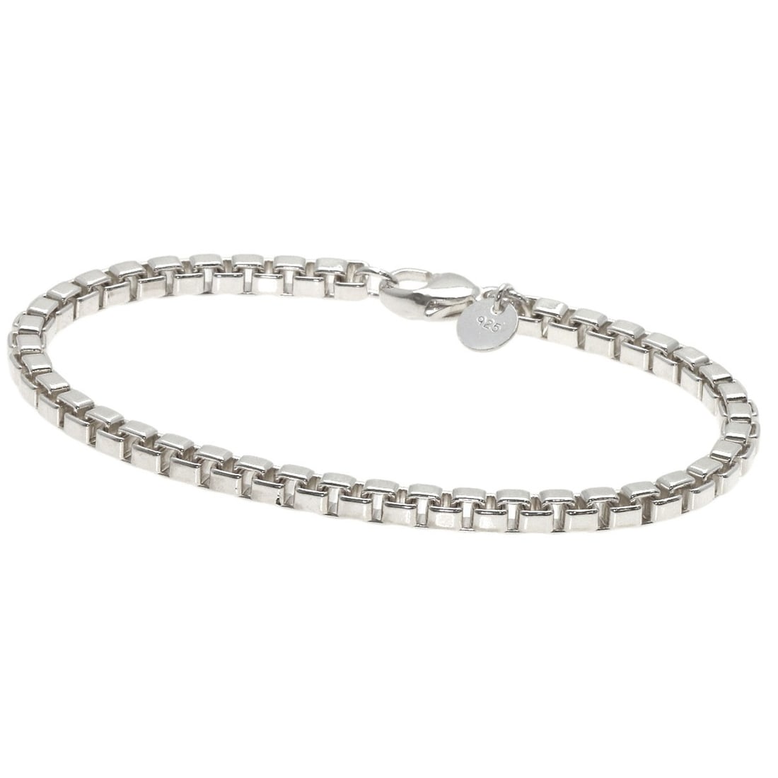 Tiffany & Co. Venetian Silver Bracelet: Tiffany & Co. Venetian Silver Bracelet Elegant and sophisticated, the Tiffany & Co. Venetian Silver Bracelet is a timeless piece that exudes refinement. Crafted from sterling silver metal with an unde