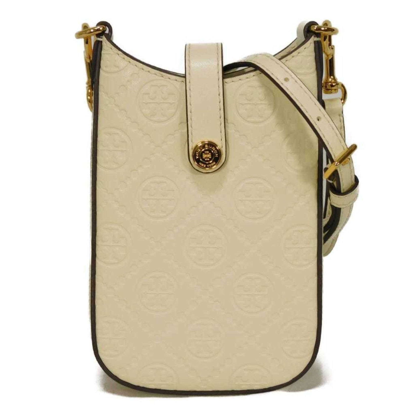 Tory Burch Leather Shoulder Bag: Tory Burch Leather Shoulder Bag Elevate your everyday style with the timeless Tory Burch Leather Shoulder Bag, boasting sleek gold hardware and a classic cream and white color palette. This versatile