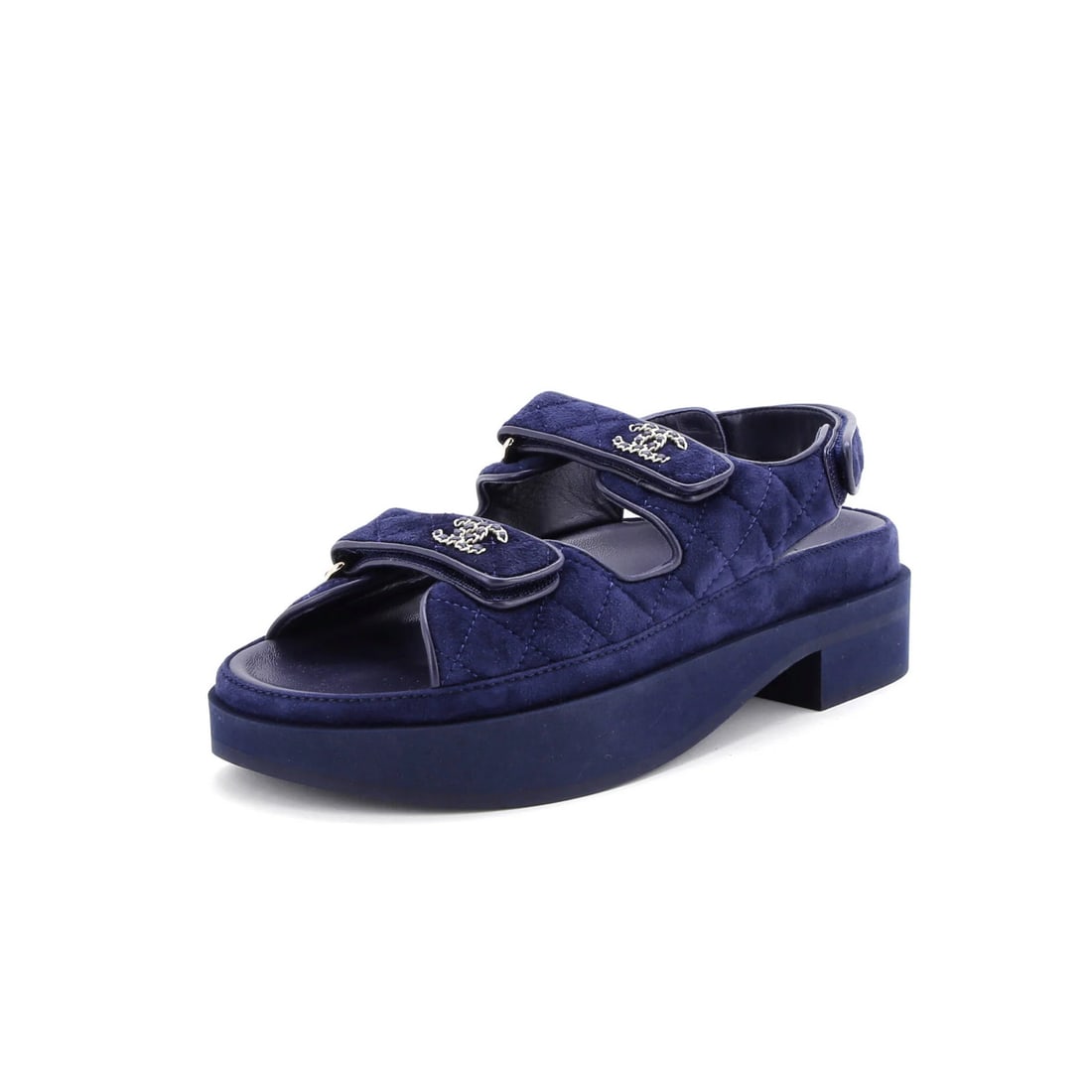 Chanel Women's Quilted Suede Dad Sandals: Chanel Women's Quilted Suede Dad Sandals Elevate your summer style with these iconic Chanel quilted suede dad sandals, boasting the brand's signature velcro closure and sleek blue hue. The perfect
