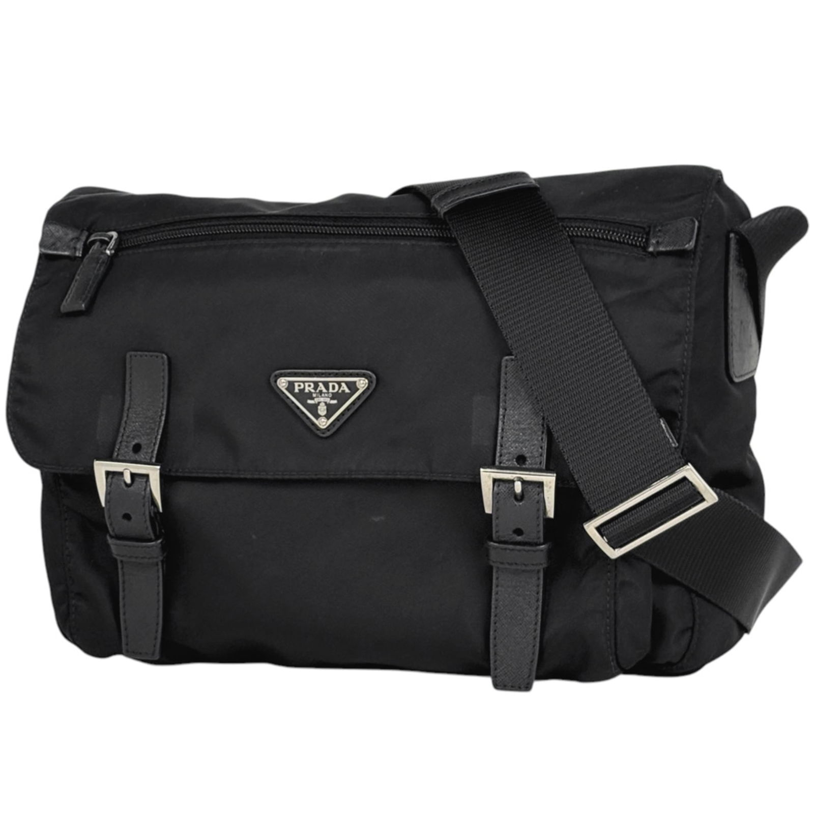 Prada Nylon and Leather Shoulder Bag: Prada Nylon and Leather Shoulder Bag A sleek and sophisticated shoulder bag, this Prada Nylon and Leather design boasts a timeless black color and durable nylon construction, paired with supple