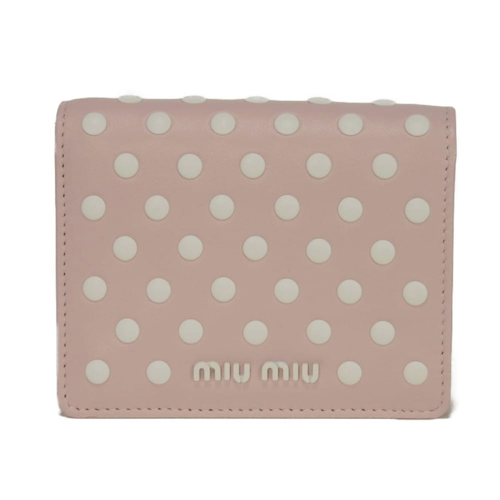 Miu Bi-Fold Leather Wallet: Miu Bi-Fold Leather Wallet Elevate your everyday style with the chic Miu Miu bi-fold leather wallet, boasting a sleek pink hue and durable snap fastener closure. This versatile accessory boasts