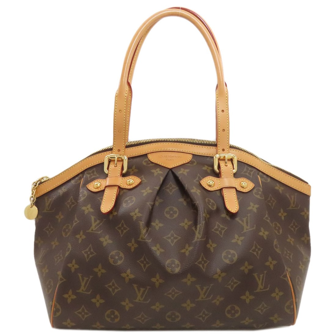 Louis Vuitton Tivoli GM Tote Bag in Monogram Canvas: Louis Vuitton Tivoli GM Tote Bag in Monogram Canvas Elevate your everyday with the iconic Louis Vuitton Tivoli GM tote bag, crafted from luxurious monogram canvas that exudes timeless sophistication.
