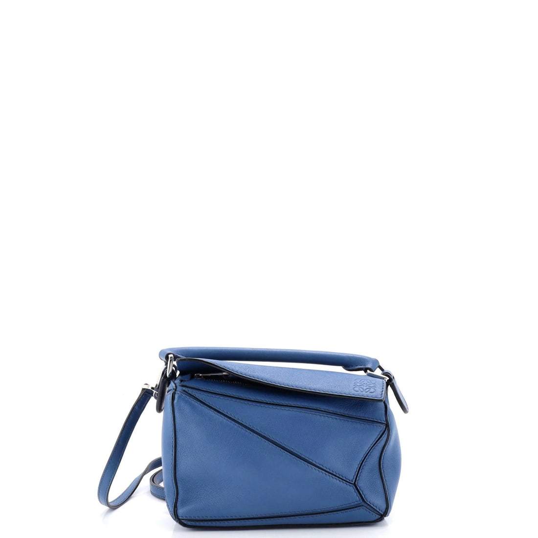 Loewe Mini Leather Puzzle Bag: Loewe Mini Leather Puzzle Bag The Loewe Mini Leather Puzzle Bag is a stylish and versatile accessory that combines sleek design with practical functionality. With its signature leather exterior,