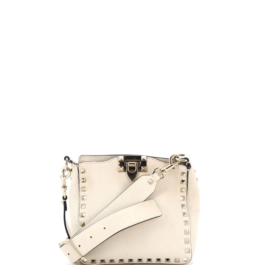 Valentino Garavani Rockstud Mini Leather Flip Lock Messenger Bag: Valentino Garavani Rockstud Mini Leather Flip Lock Messenger Bag Elevate your everyday style with the iconic Valentino Garavani Rockstud Mini Leather Flip Lock Messenger Bag, boasting sleek white
