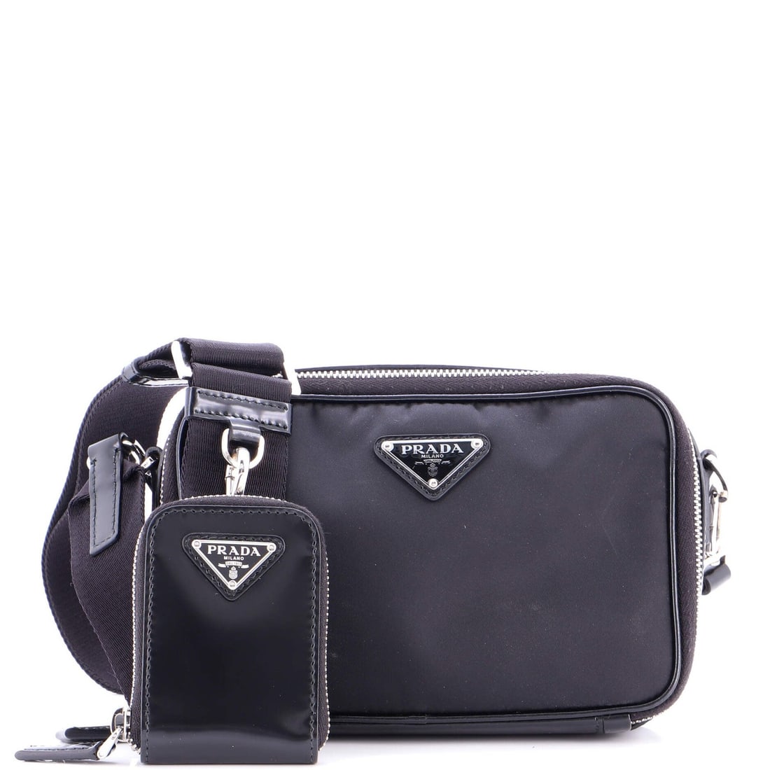 Prada Brique Camera Crossbody Bag - Tessuto and Spazzolato Leather Small: Prada Brique Camera Crossbody Bag - Tessuto and Spazzolato Leather Small The Prada Brique Camera Crossbody Bag is a stylish and functional accessory that combines Tessuto and Spazzolato leather for a