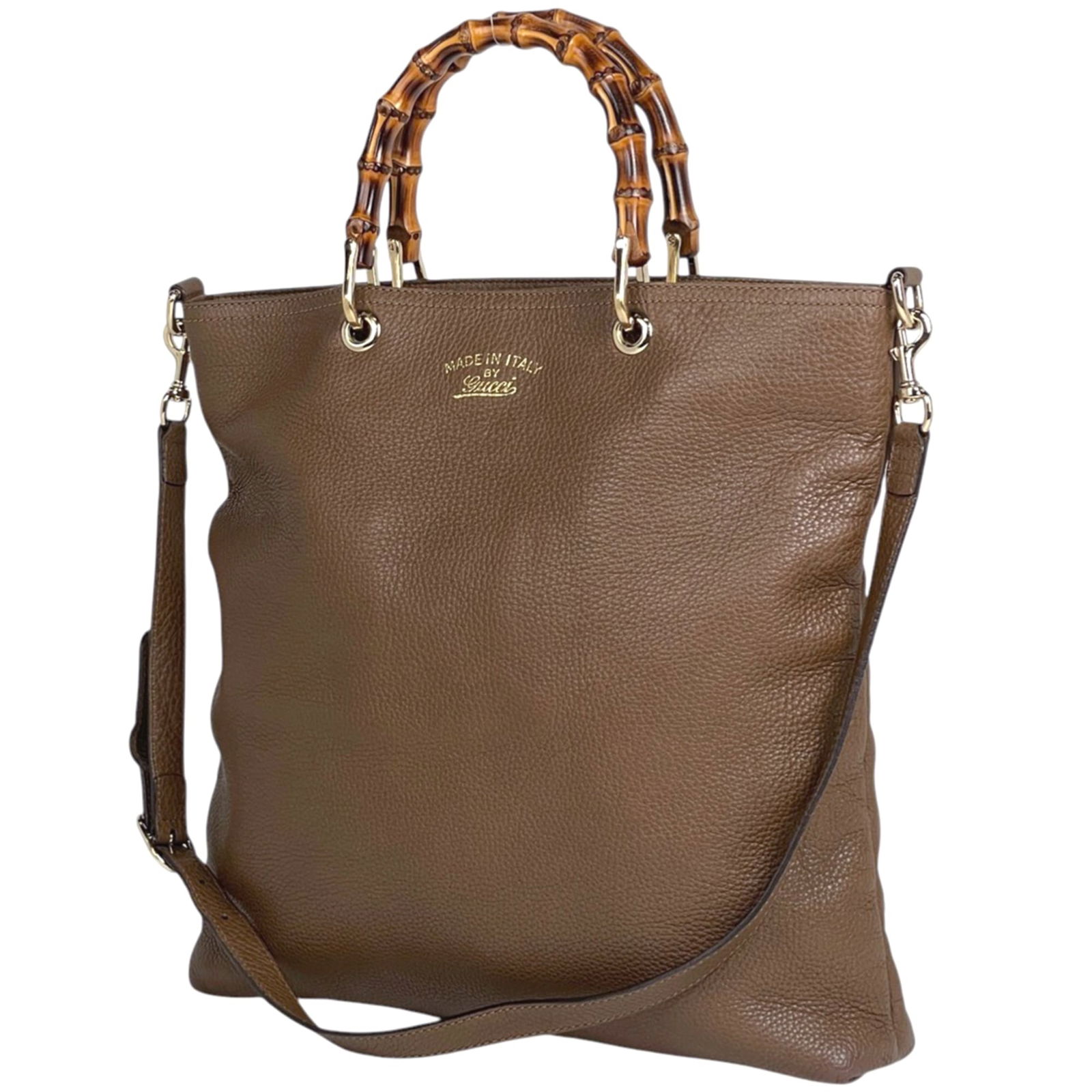 Gucci Leather Tote Bag: Gucci Leather Tote Bag Experience the timeless elegance of Gucci with this stunning brown leather tote bag, boasting classic shoulder strap design and premium quality construction that will elevate