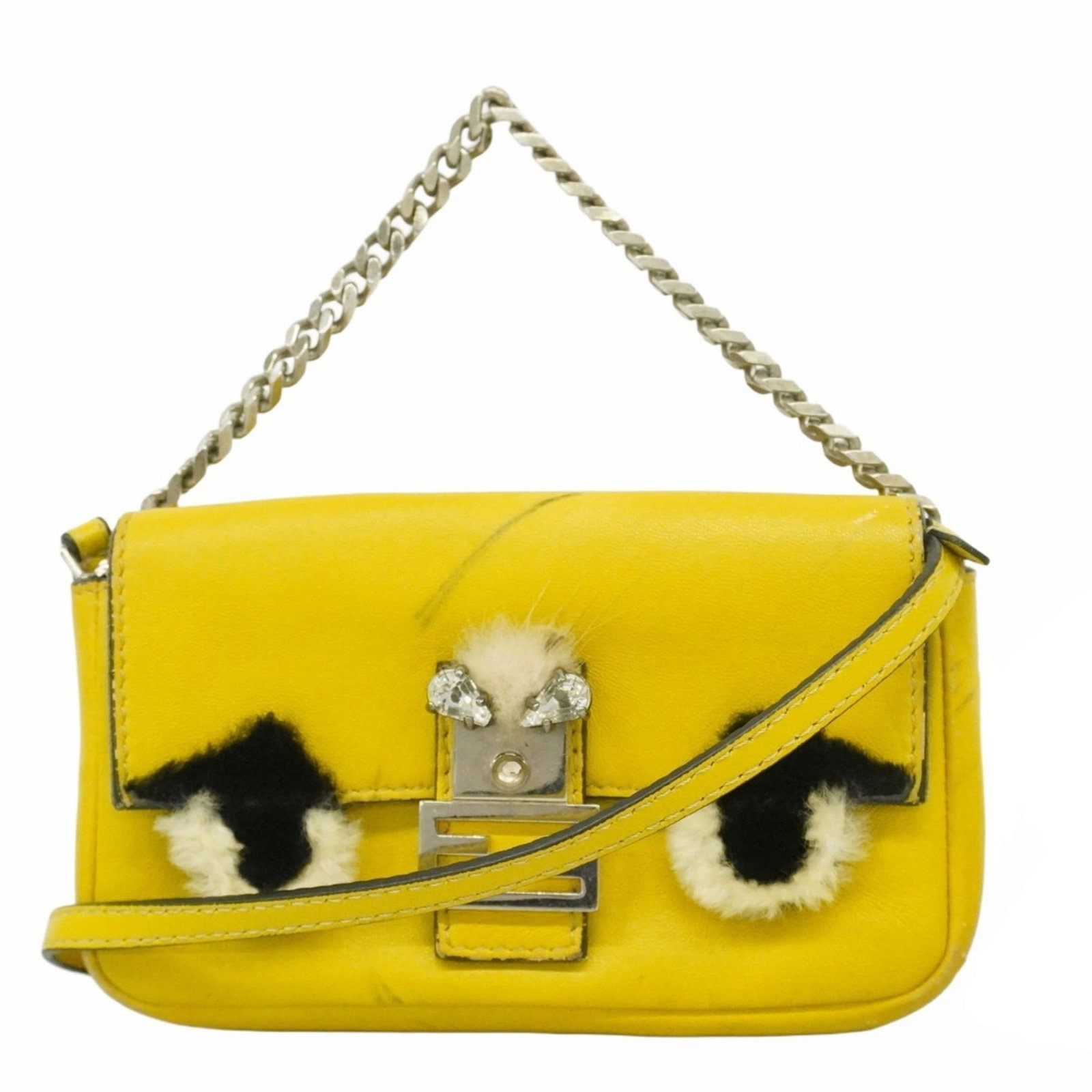 Leather Fendi Handbag: Leather Fendi Handbag A vibrant and stylish Fendi handbag in sunny yellow leather, adorned with sleek silver hardware, adds a pop of color to any outfit. With its classic design and premium materials,