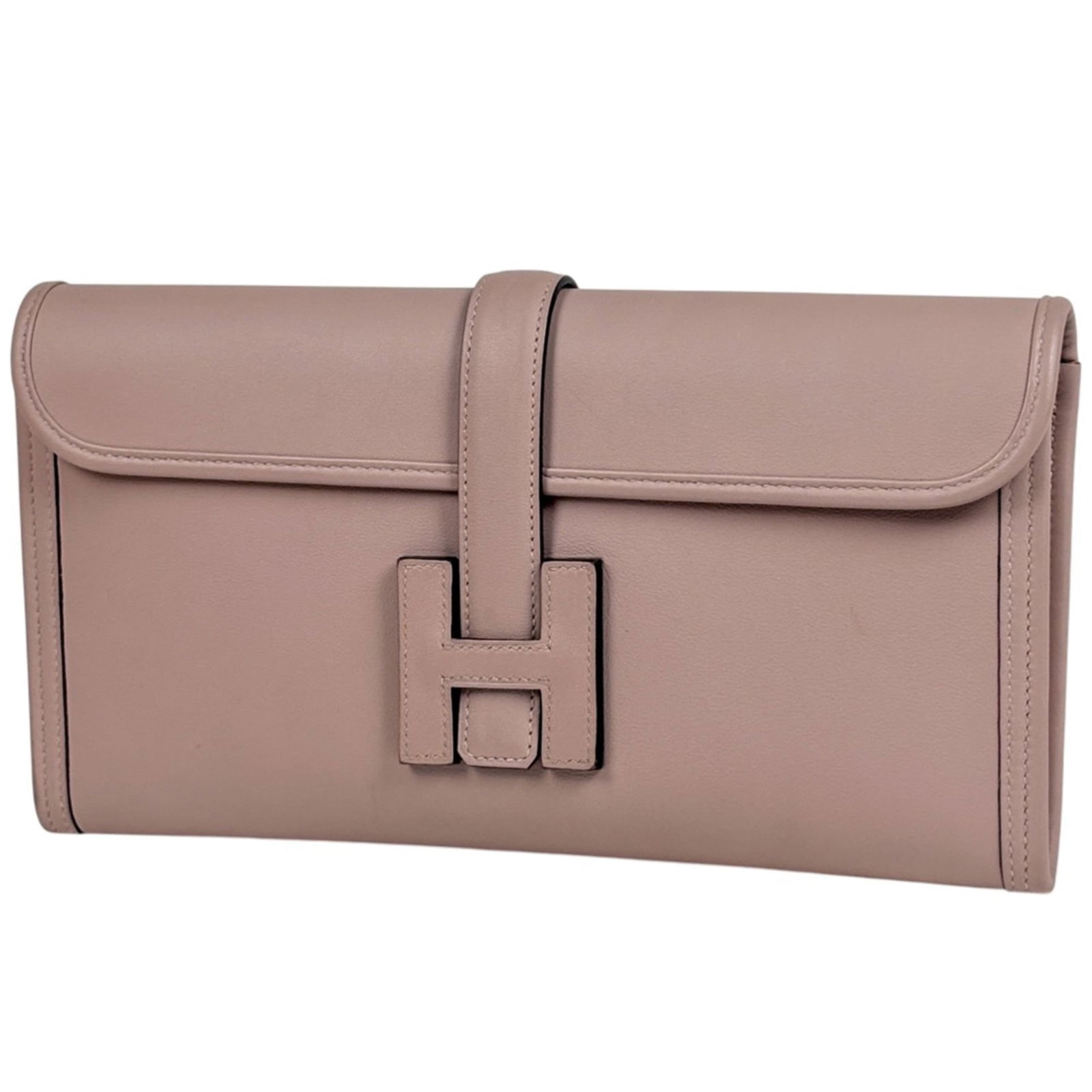 Hermes Swift Leather Clutch Bag: Hermes Swift Leather Clutch Bag A stunning pink Swift Leather Clutch Bag from the iconic French fashion house Hermes, boasting sleek lines and premium quality that exudes timeless elegance. With its
