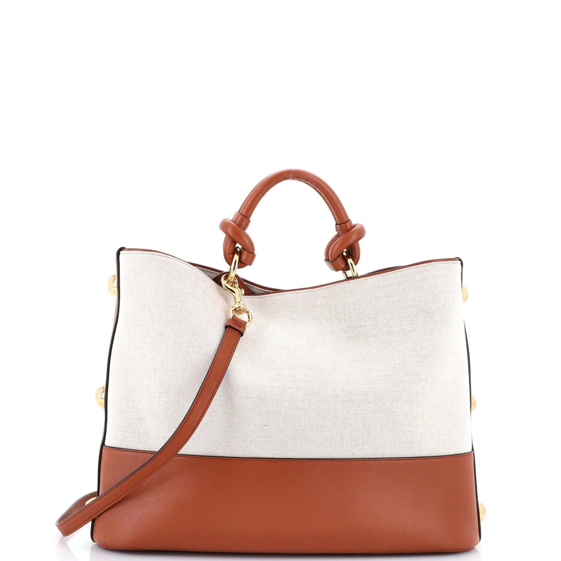 Salvatore Ferragamo Canvas and Leather Glam Tote Bag: Salvatore Ferragamo Canvas and Leather Glam Tote Bag Elevate your everyday style with the iconic Salvatore Ferragamo Glam Tote Bag, boasting sleek canvas and leather exterior that exudes