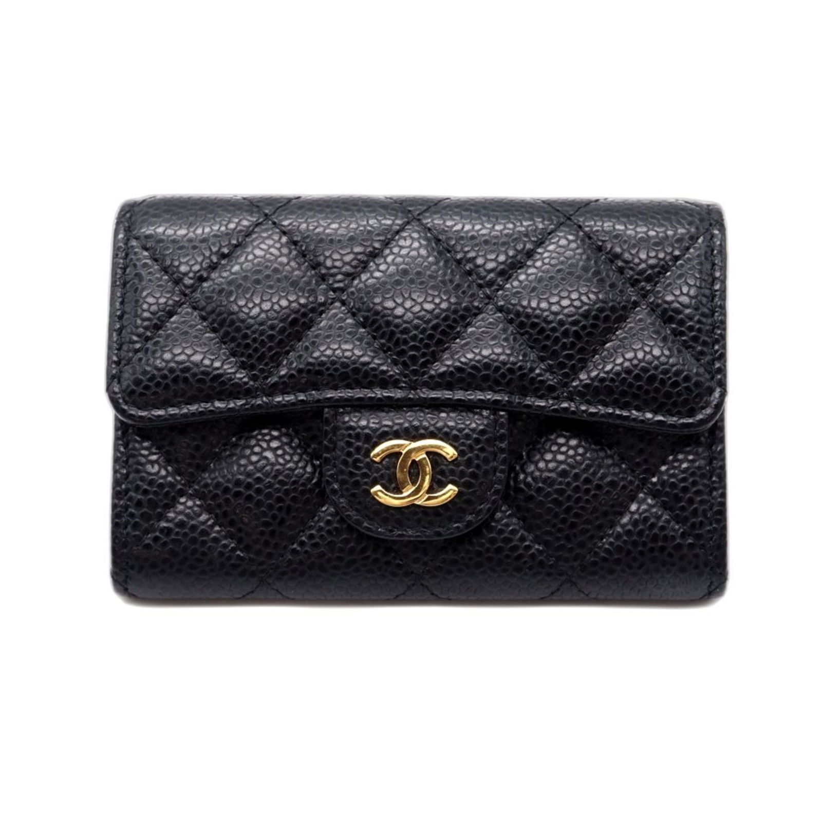 Chanel Grained Calfskin Card Case: Chanel Grained Calfskin Card Case A timeless Chanel card case, crafted from rich grained calfskin, adds a touch of sophistication to any woman's wallet and keys. With its classic design and