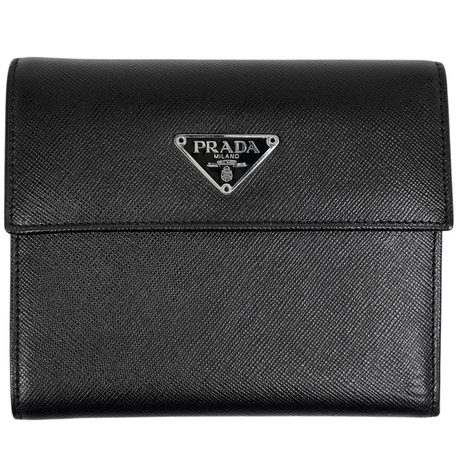 Prada Tri-Fold Leather Wallet: Prada Tri-Fold Leather Wallet A stylish and functional Prada tri-fold leather wallet, perfect for adding a touch of luxury to your daily essentials. With its sleek black design and durable leather