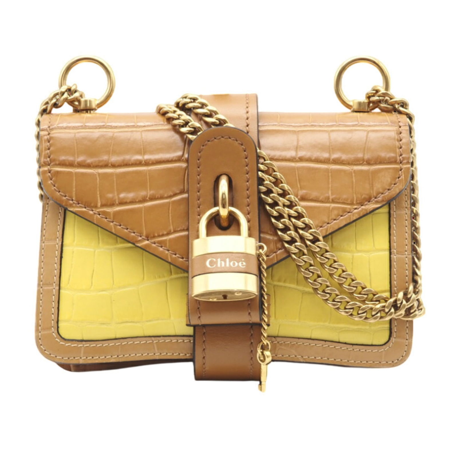 Leather Chlo Shoulder Bag: Leather Chlo Shoulder Bag A vibrant yellow leather shoulder bag from Chlo, perfect for adding a pop of color to your daily routine. With its classic design and durable construction, this stylish bag