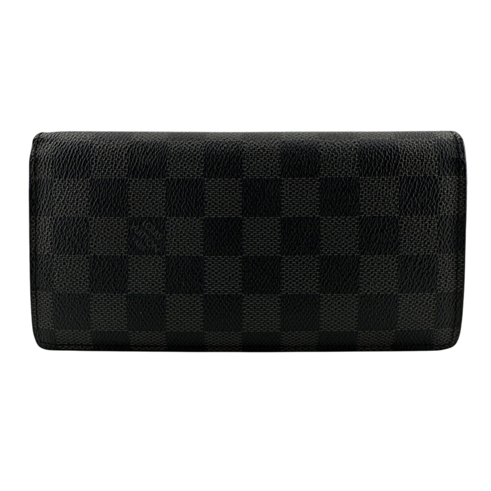 Louis Vuitton Bi-Fold Pvc Wallet: Louis Vuitton Bi-Fold Pvc Wallet A sleek and timeless accessory, this Louis Vuitton bi-fold wallet boasts the iconic brand's signature monogram pattern and durable PVC construction, making it a