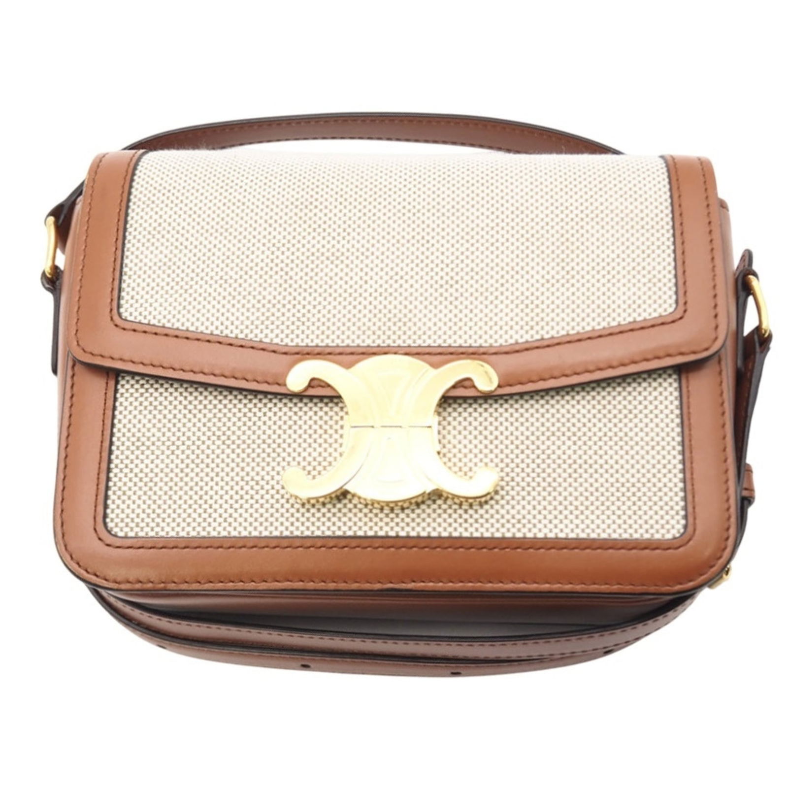 Celine Canvas Shoulder Bag: Celine Canvas Shoulder Bag A pre-loved Celine canvas shoulder bag, offering a chic and timeless design with its classic shape and sturdy canvas material. With its 14cm x 18.5cm size, it's the perfect