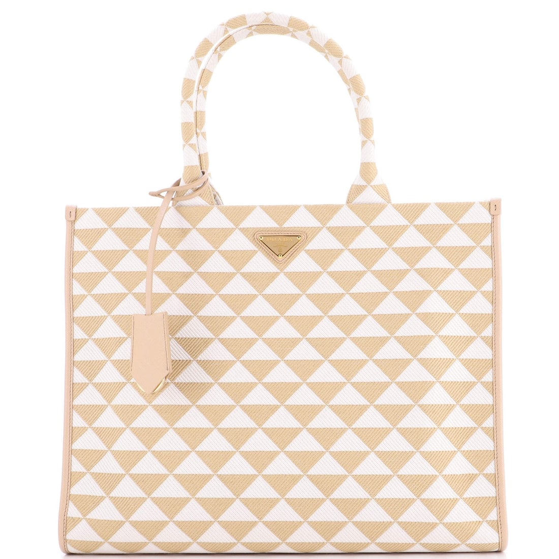 Prada Symbole Shopper Tote in Large Jacquard: Prada Symbole Shopper Tote in Large Jacquard The Prada Symbole Shopper Tote in Large Jacquard is a timeless and sophisticated accessory that exudes elegance with its neutral exterior and richly