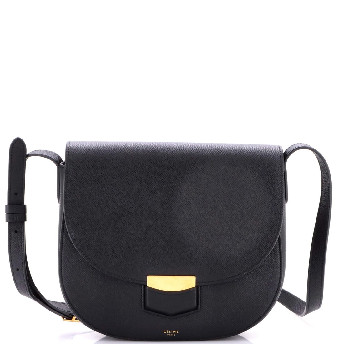 Celine Medium Grainy Leather Crossbody Bag Trotteur: Celine Medium Grainy Leather Crossbody Bag Trotteur The Celine Trotteur crossbody bag boasts a chic, grainy leather exterior in sleek black, complemented by rich gold hardware and a spacious