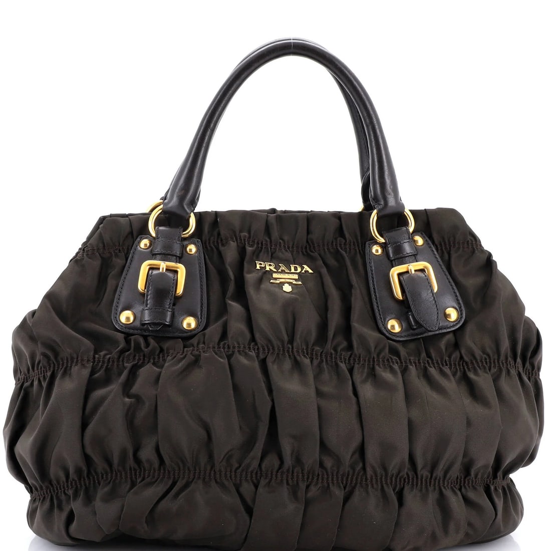 Prada Gaufre Convertible Tote in Leather and Tessuto - Large: Prada Gaufre Convertible Tote in Leather and Tessuto - Large The Prada Gaufre Convertible Tote is a stylish and versatile accessory that combines the best of both worlds - leather and nylon materials.