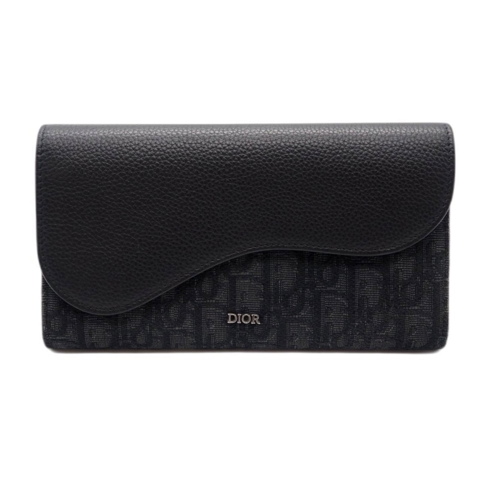 Canvas - Christian Dior Long Wallet (Bi-Fold) Leather: Canvas - Christian Dior Long Wallet (Bi-Fold) Leather A sleek and sophisticated accessory for the modern gentleman, this Christian Dior bi-fold wallet boasts a timeless design with clean lines and a