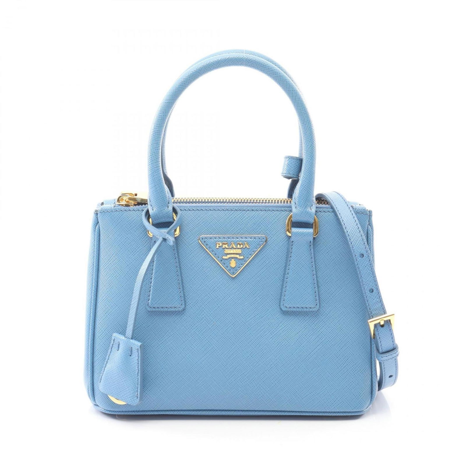 Prada Saffiano Triangle Handbag: Prada Saffiano Triangle Handbag A stunning Prada Saffiano Triangle handbag in a beautiful blue hue, boasting the iconic triangle-shaped design that has become synonymous with luxury and