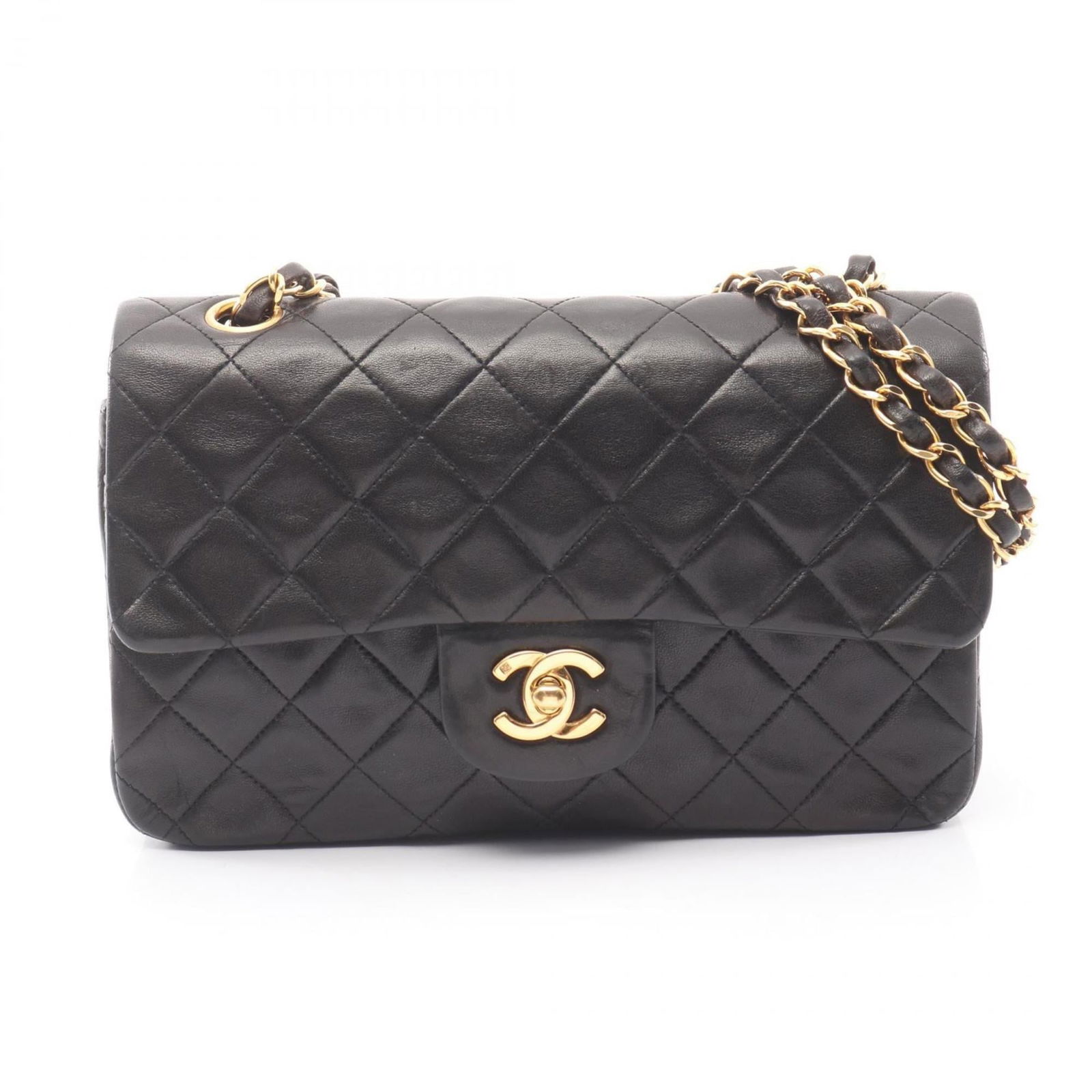 Chanel Shoulder Bag in Leather: Chanel Shoulder Bag in Leather A timeless Chanel shoulder bag in luxurious lambskin leather, this classic design is both stylish and versatile. With its sleek black finish and compact size, it's perfe