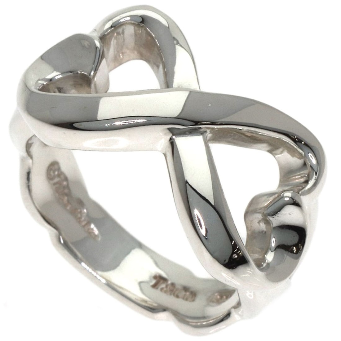 Tiffany & Co. Double Loving Heart Ring in Silver: Tiffany & Co. Double Loving Heart Ring in Silver Elevate your style with the timeless Tiffany & Co. Double Loving Heart Ring in silver, a classic design that exudes elegance and sophistication. This