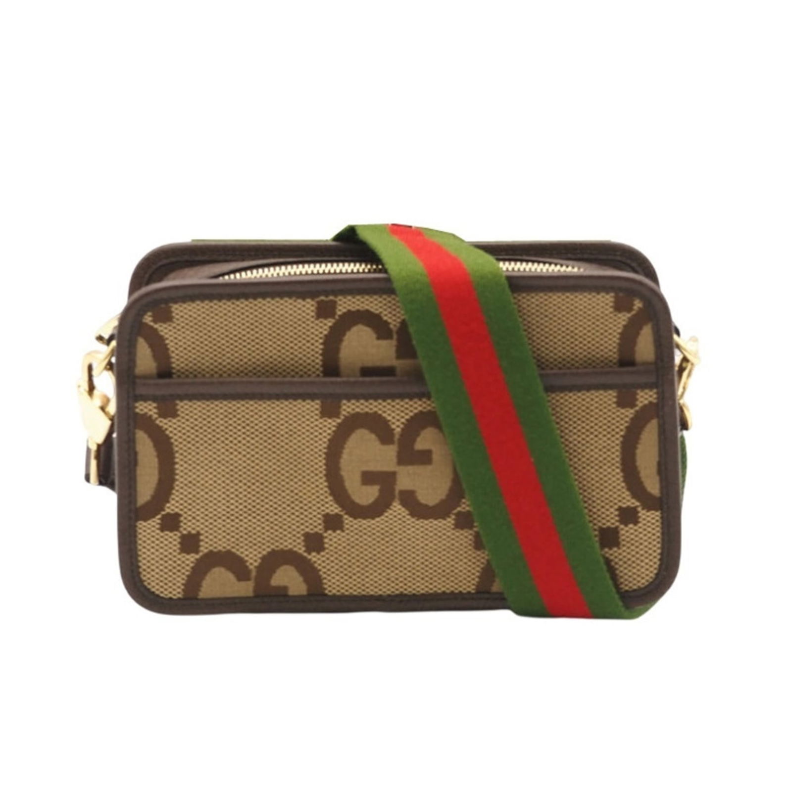 Gucci Canvas and Leather Shoulder Bag: Gucci Canvas and Leather Shoulder Bag A timeless Gucci shoulder bag, crafted from canvas and leather, boasts a classic beige brown hue that adds warmth to any outfit. With its spacious interior and