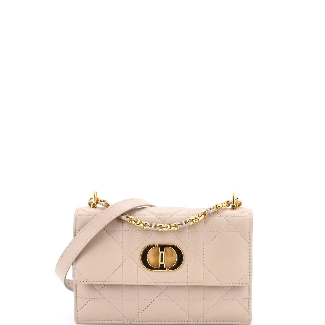 Christian Dior Miss Caro Flap Bag in Cannage Quilt Calfskin Mini: Christian Dior Miss Caro Flap Bag in Cannage Quilt Calfskin Mini The Christian Dior Miss Caro Flap Bag in Cannage Quilt Calfskin Mini is a timeless, neutral beauty that exudes understated elegance. Wi