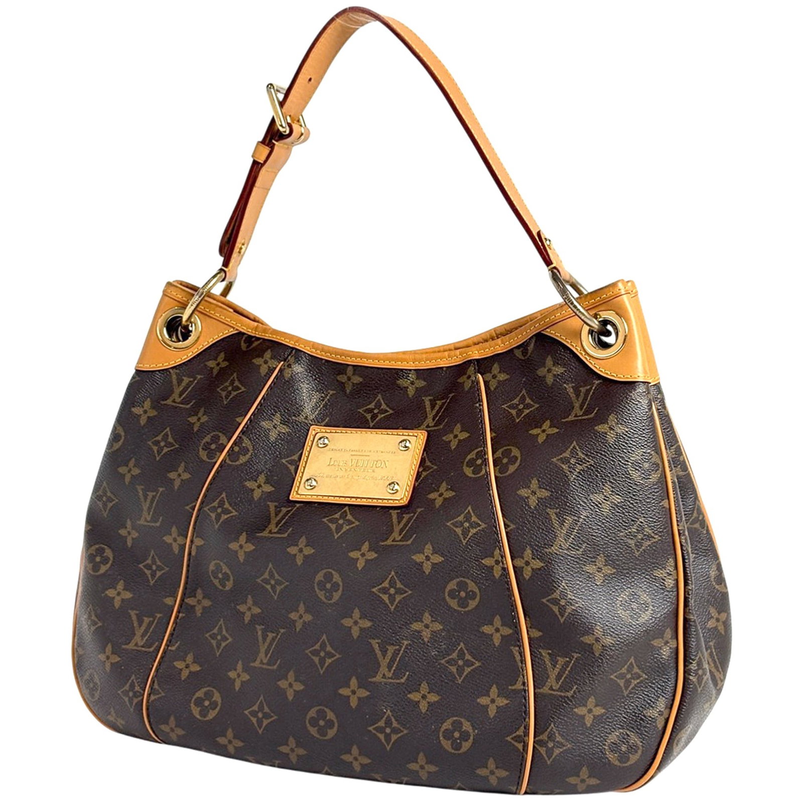 Louis Vuitton Monogram Shoulder Bag: Louis Vuitton Monogram Shoulder Bag A timeless piece from the iconic Louis Vuitton Monogram collection, this brown shoulder bag boasts the signature interlocking LV monogram pattern and sleek design t