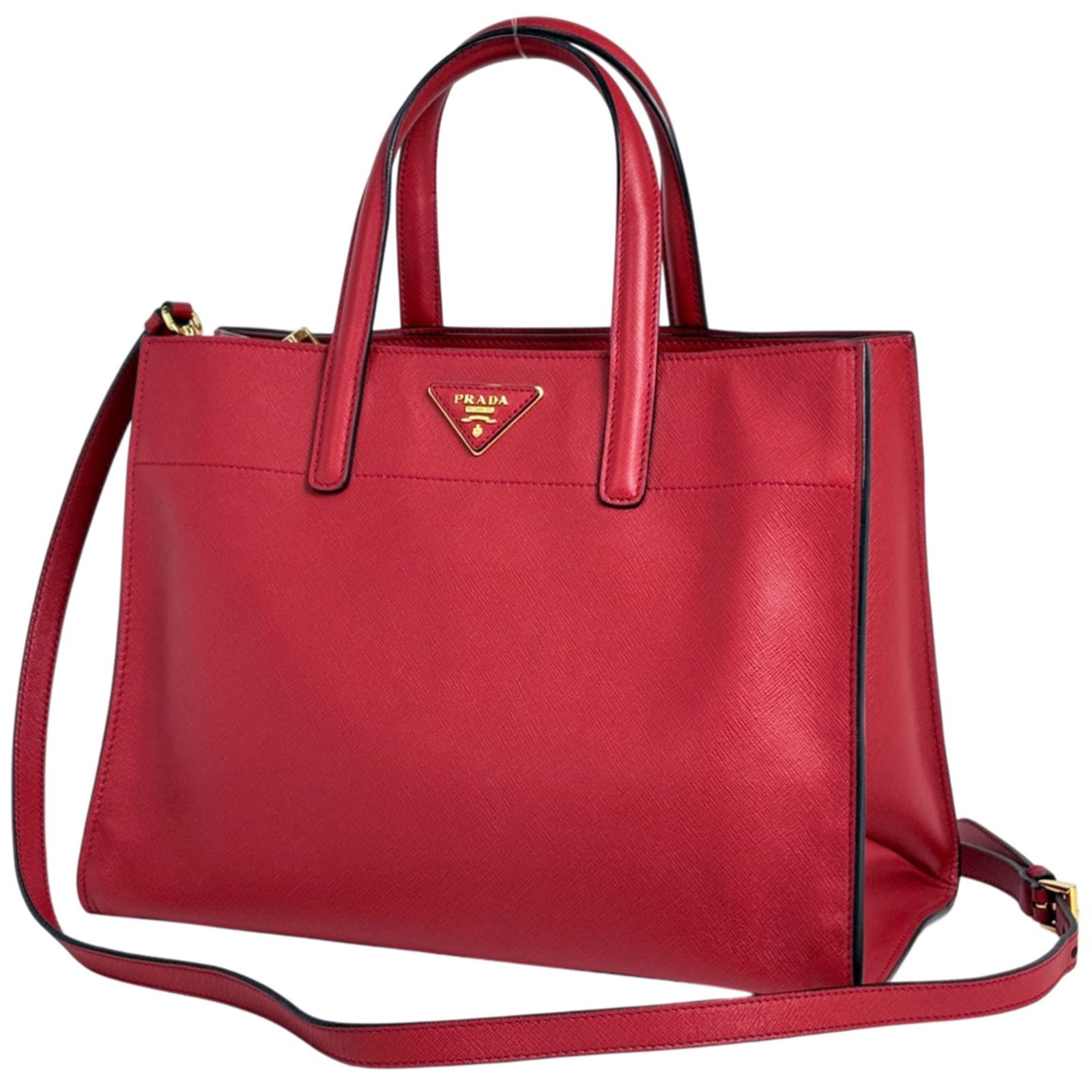 Prada Saffiano Leather Triangle Tote Bag: Prada Saffiano Leather Triangle Tote Bag A vibrant red Prada Saffiano Leather triangle tote bag, perfect for adding a pop of color to your daily routine. With its durable and water-resistant Saffiano