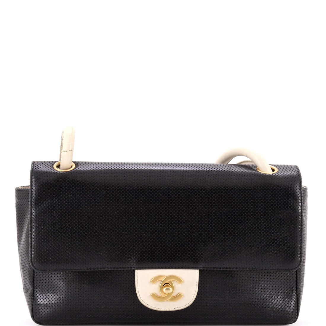 Chanel Vintage CC Flap Shoulder Bag in Perforated Leather Medium: Chanel Vintage CC Flap Shoulder Bag in Perforated Leather Medium Experience the timeless elegance of a vintage Chanel CC Flap shoulder bag, crafted from rich perforated leather that adds a touch of