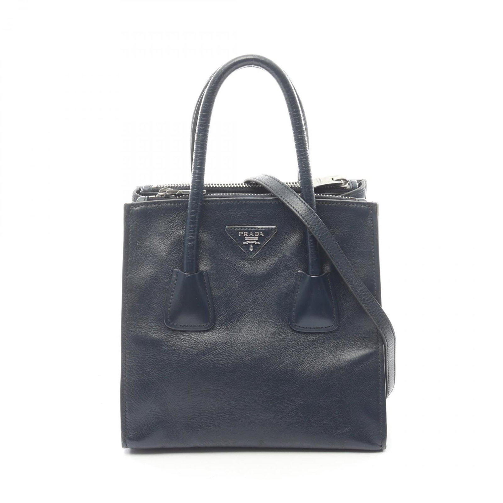 Prada Leather Tote Bag: Prada Leather Tote Bag A timeless and sophisticated Prada leather tote bag, perfect for work or everyday errands, boasts a classic navy hue and premium leather construction that exudes luxury. With