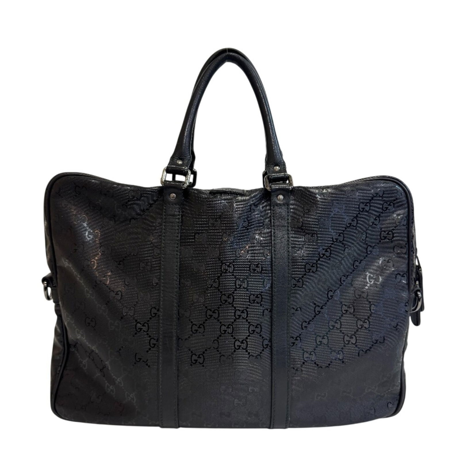 Gucci PVC Briefcase: Gucci PVC Briefcase A sleek and stylish Gucci briefcase, crafted from durable PVC material, boasts a classic black finish that exudes sophistication. With its spacious interior and adjustable handle,