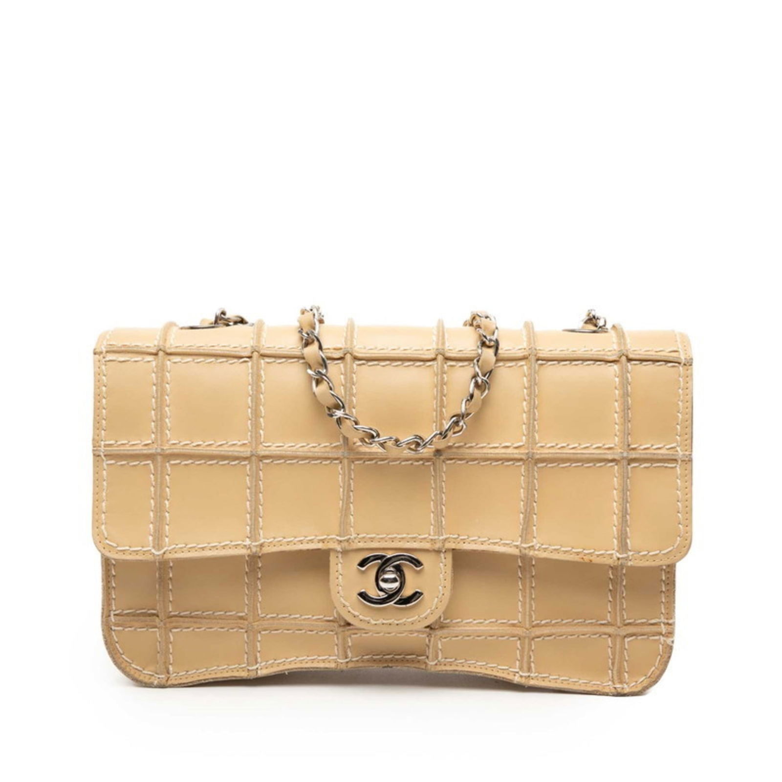 Chanel Shoulder Bag in Leather: Chanel Shoulder Bag in Leather A timeless Chanel shoulder bag in rich beige leather, perfect for adding a touch of sophistication to any outfit. With its classic design and spacious interior, this sty