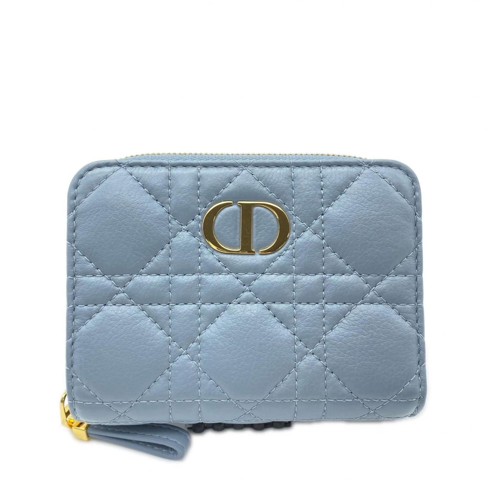 Christian Dior Bi-Fold Leather Wallet: Christian Dior Bi-Fold Leather Wallet A stunning Christian Dior bi-fold leather wallet, crafted from rich calfskin and boasting a sleek blue hue, adds a touch of sophistication to any daily routine.