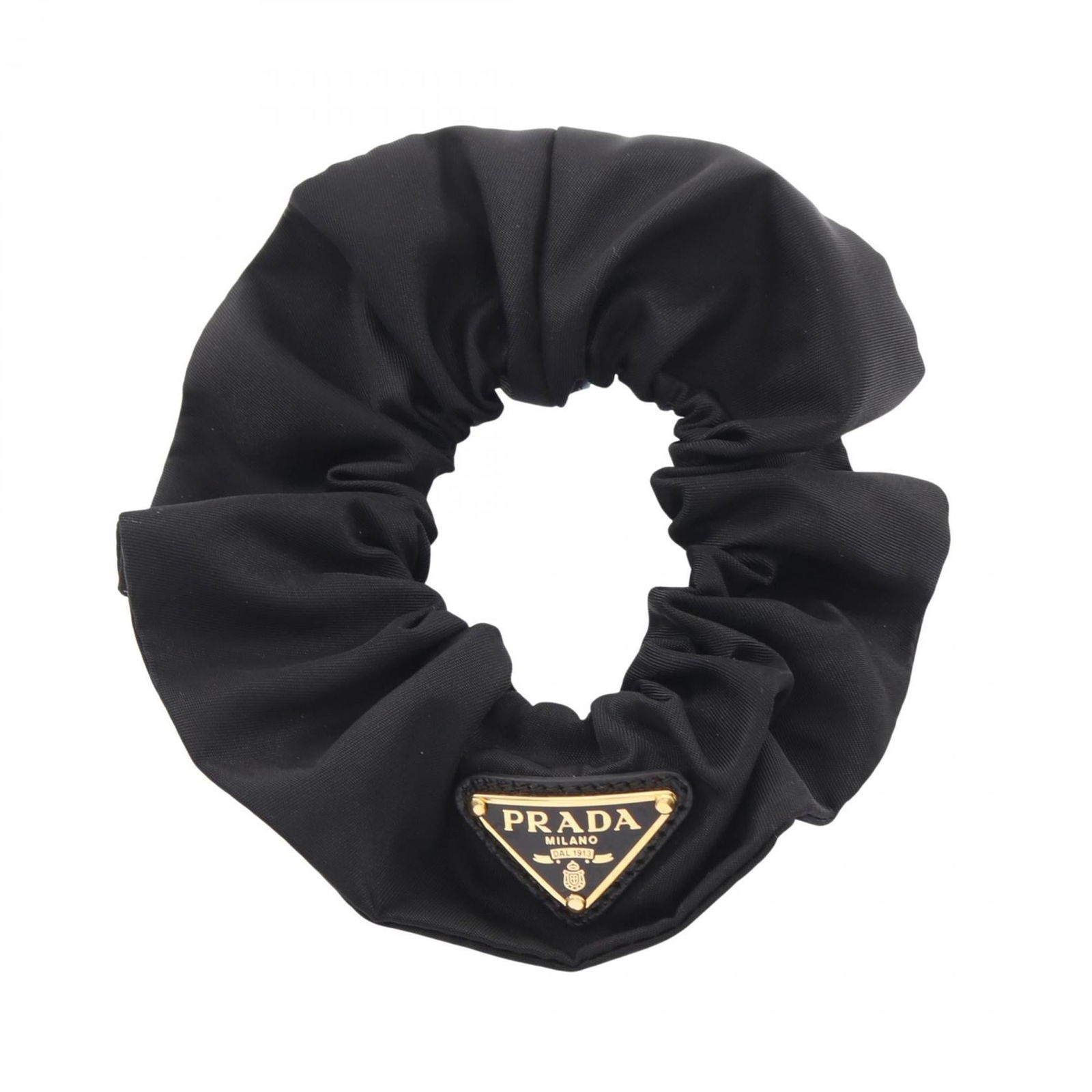 Prada Nylon Scrunchie: Prada Nylon Scrunchie Add a touch of sophisticated chic to your everyday look with this Prada Nylon Scrunchie, crafted from durable nylon material and boasting a sleek black finish that exudes