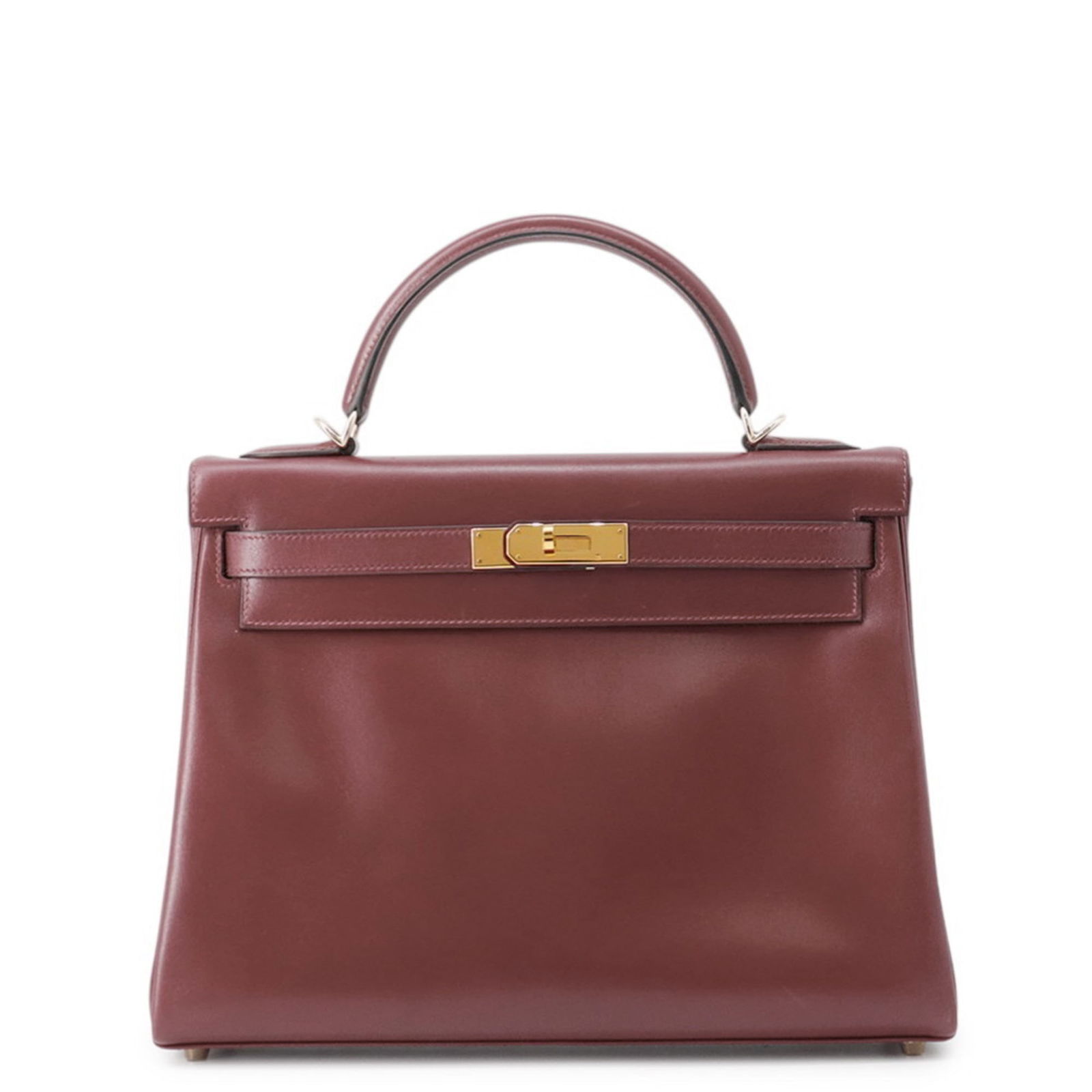 Leather Hermes Handbag Box Calf: Leather Hermes Handbag Box Calf A stunning pre-owned Box Calf leather Hermes handbag in the iconic Rouge color, boasting classic design and timeless elegance. With its rich box calf leather and