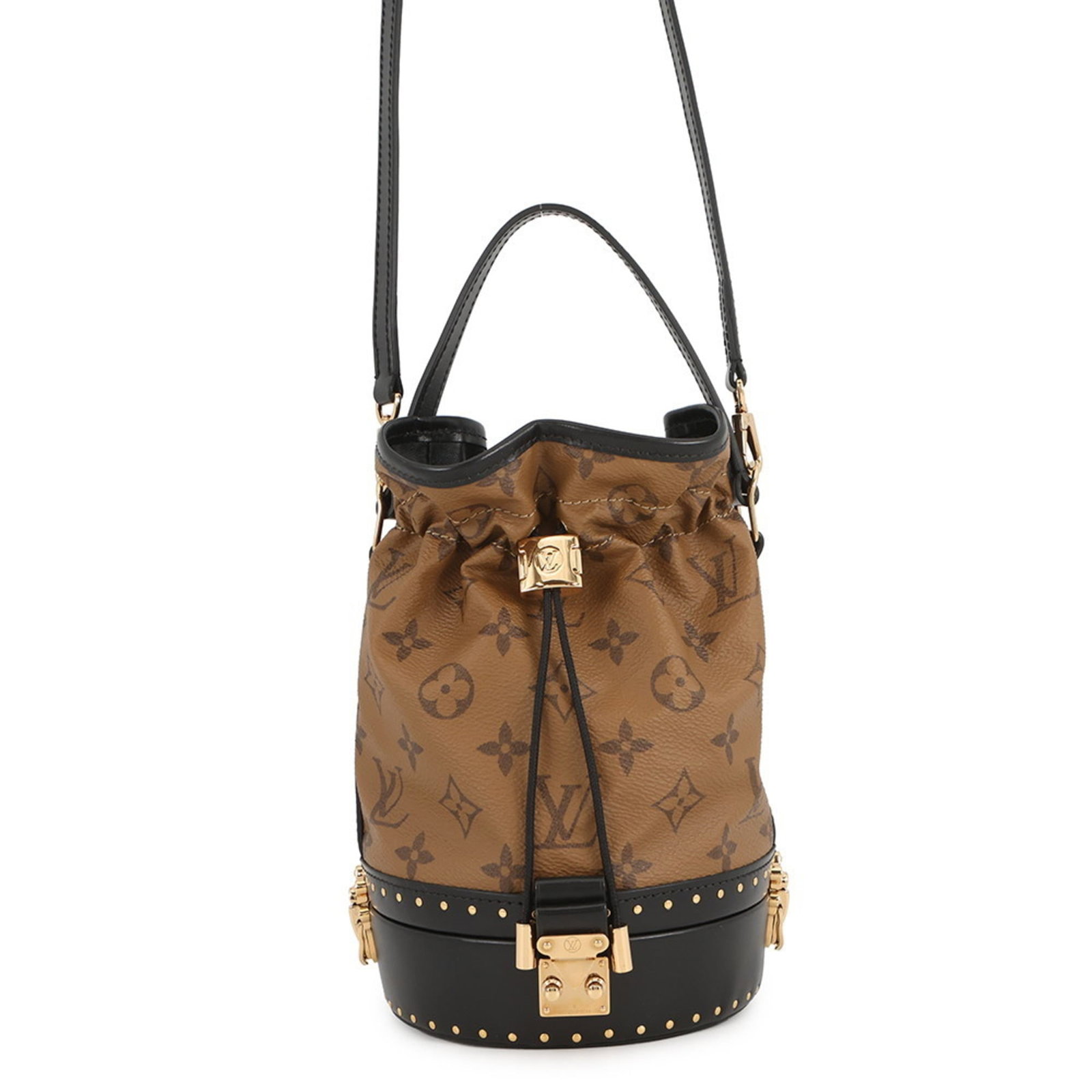 Louis Vuitton Monogram Reverse Handbag: Louis Vuitton Monogram Reverse Handbag Experience the timeless elegance of Louis Vuitton with this stunning Monogram Reverse Handbag. Featuring the iconic monogram pattern in reverse, this sleek and s