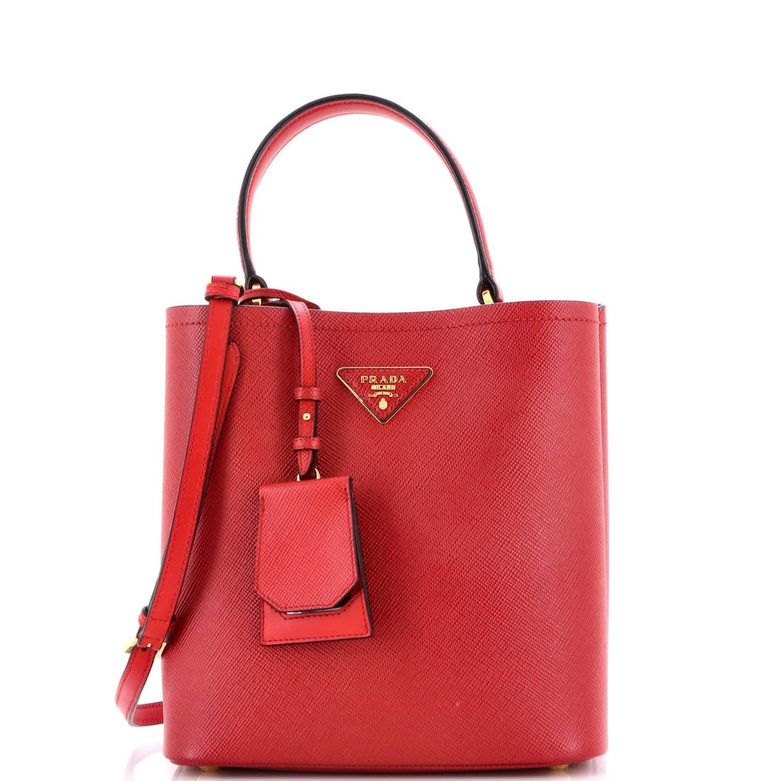 Prada Panier Bucket Bag in Saffiano Leather, Medium: Prada Panier Bucket Bag in Saffiano Leather, Medium The Prada Panier Bucket Bag in Saffiano Leather is a timeless and stylish accessory that exudes luxury. With its iconic red exterior, gold