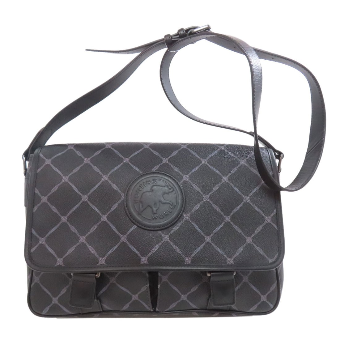 Hunting World Logo PVC Shoulder Bag: Hunting World Logo PVC Shoulder Bag A durable and versatile hunting companion, this black PVC shoulder bag is built to withstand the rigors of the great outdoors. With its water-resistant exterior