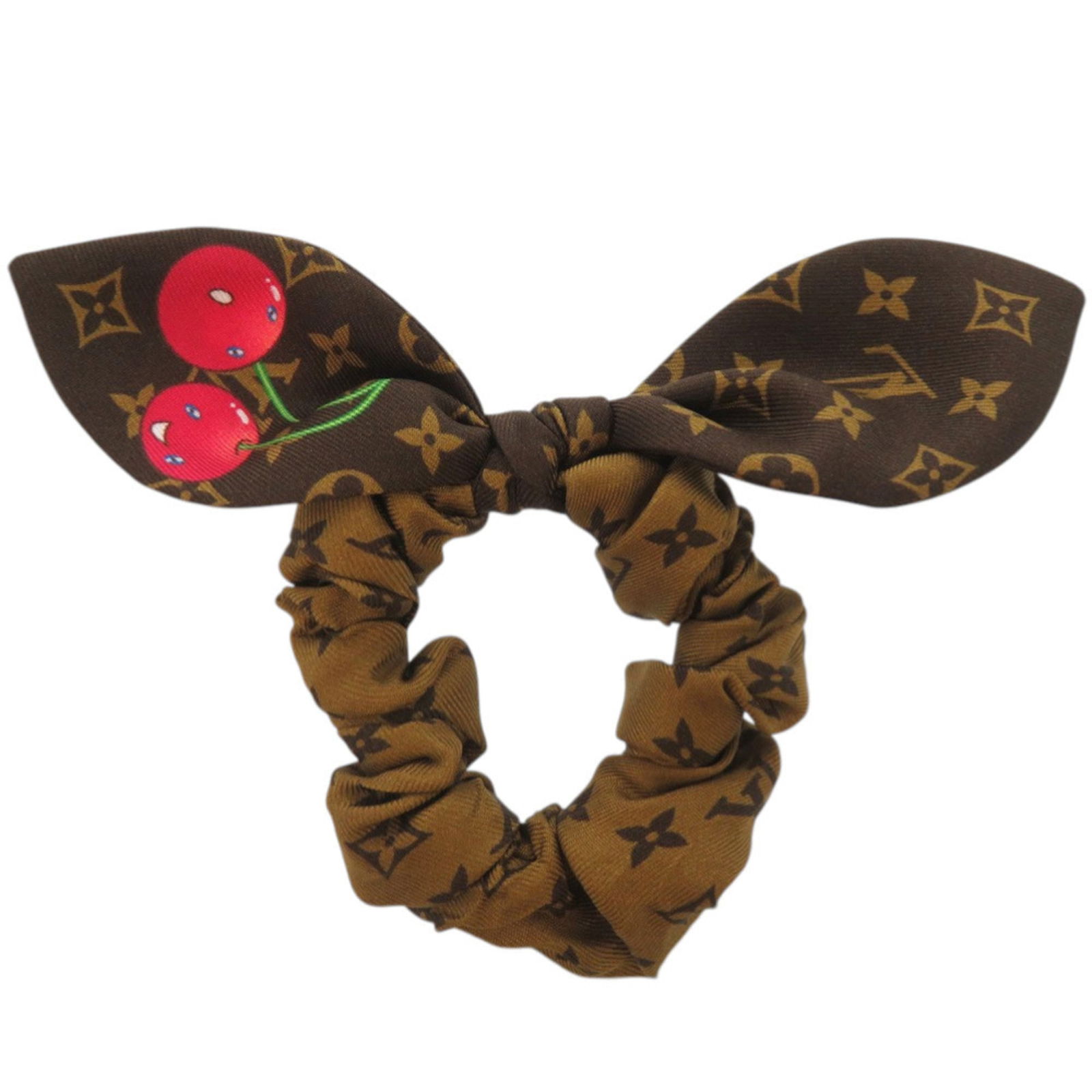Louis Vuitton silk scrunchie: Louis Vuitton silk scrunchie Elevate your everyday style with this luxurious Louis Vuitton silk scrunchie, featuring the iconic monogram pattern in rich brown tones. Made from high-quality silk, it