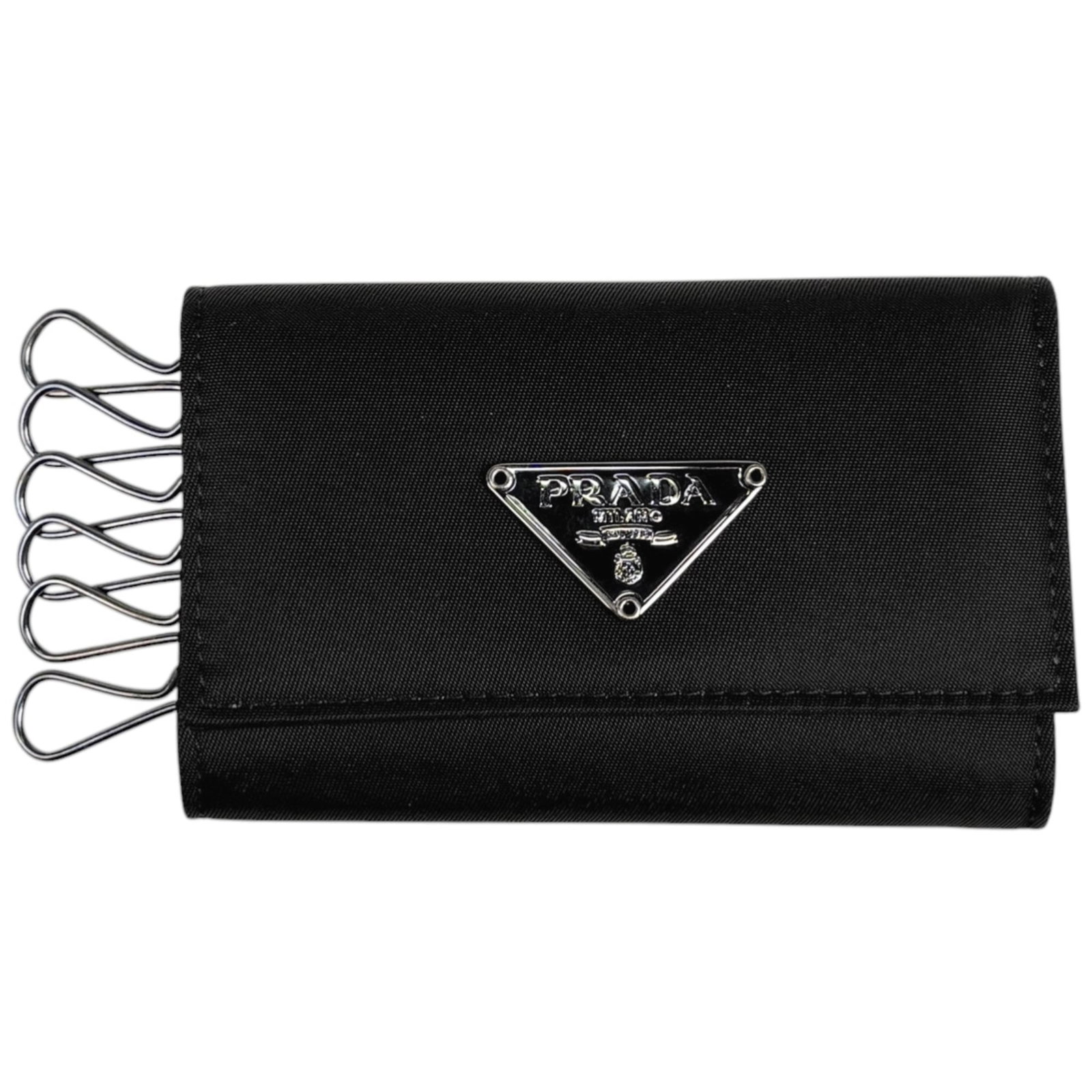 Nylon Prada Keycase: Nylon Prada Keycase A sleek and sophisticated accessory for the modern woman, this Prada keycase is crafted from durable nylon and boasts a chic black finish. With its classic design and timeless styl