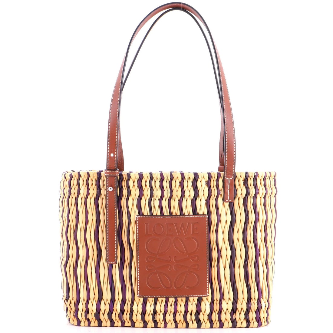 Loewe Small Woven Raffia Square Basket Tote: Loewe Small Woven Raffia Square Basket Tote Elevate your everyday with the timeless charm of Loewe's Small Woven Raffia Square Basket Tote, crafted from rich brown raffia that adds warmth and texture