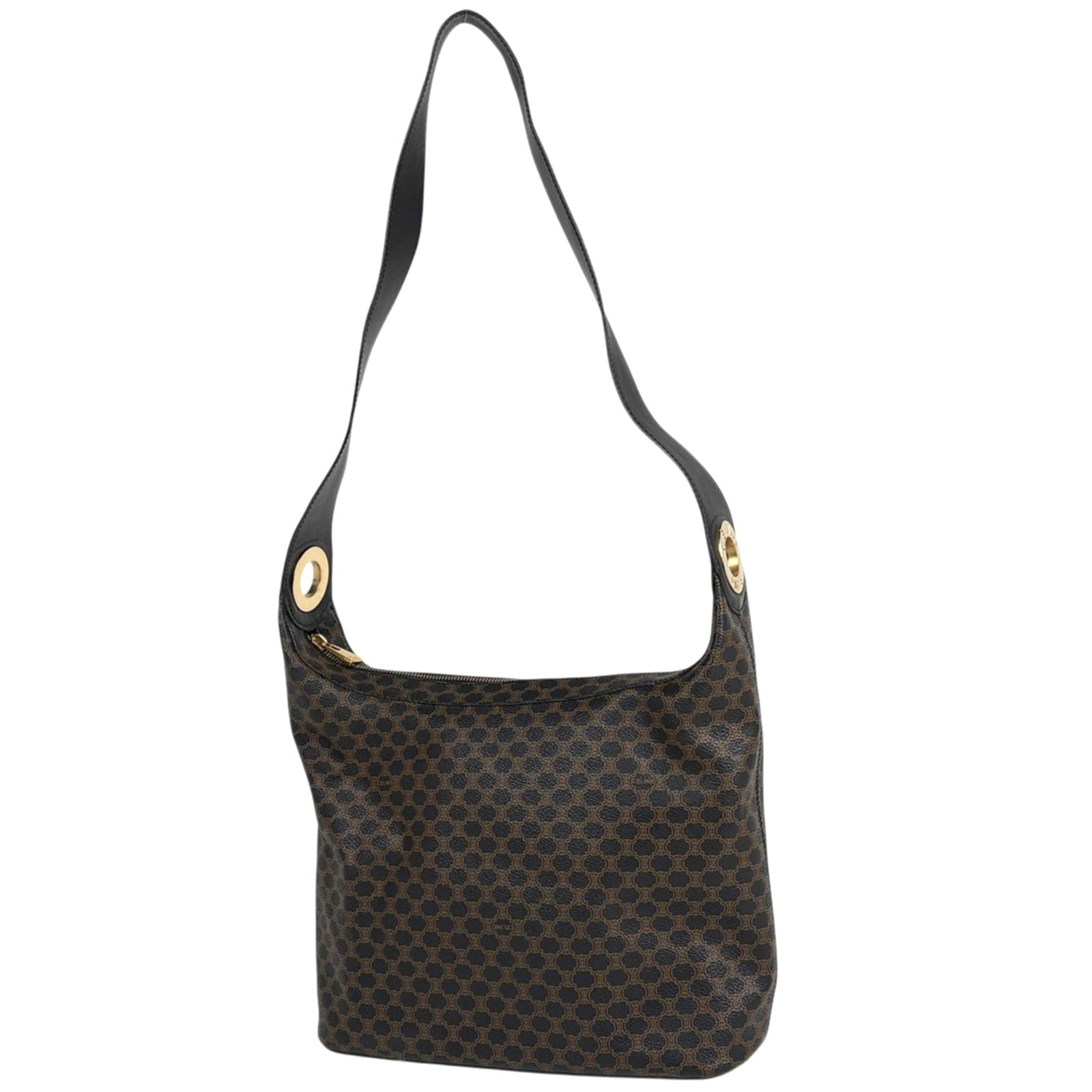 Celine Shoulder Bag in Coated Canvas and Leather: Celine Shoulder Bag in Coated Canvas and Leather A sleek and sophisticated Celine shoulder bag, crafted from durable coated canvas and supple leather, adds a touch of understated elegance to any