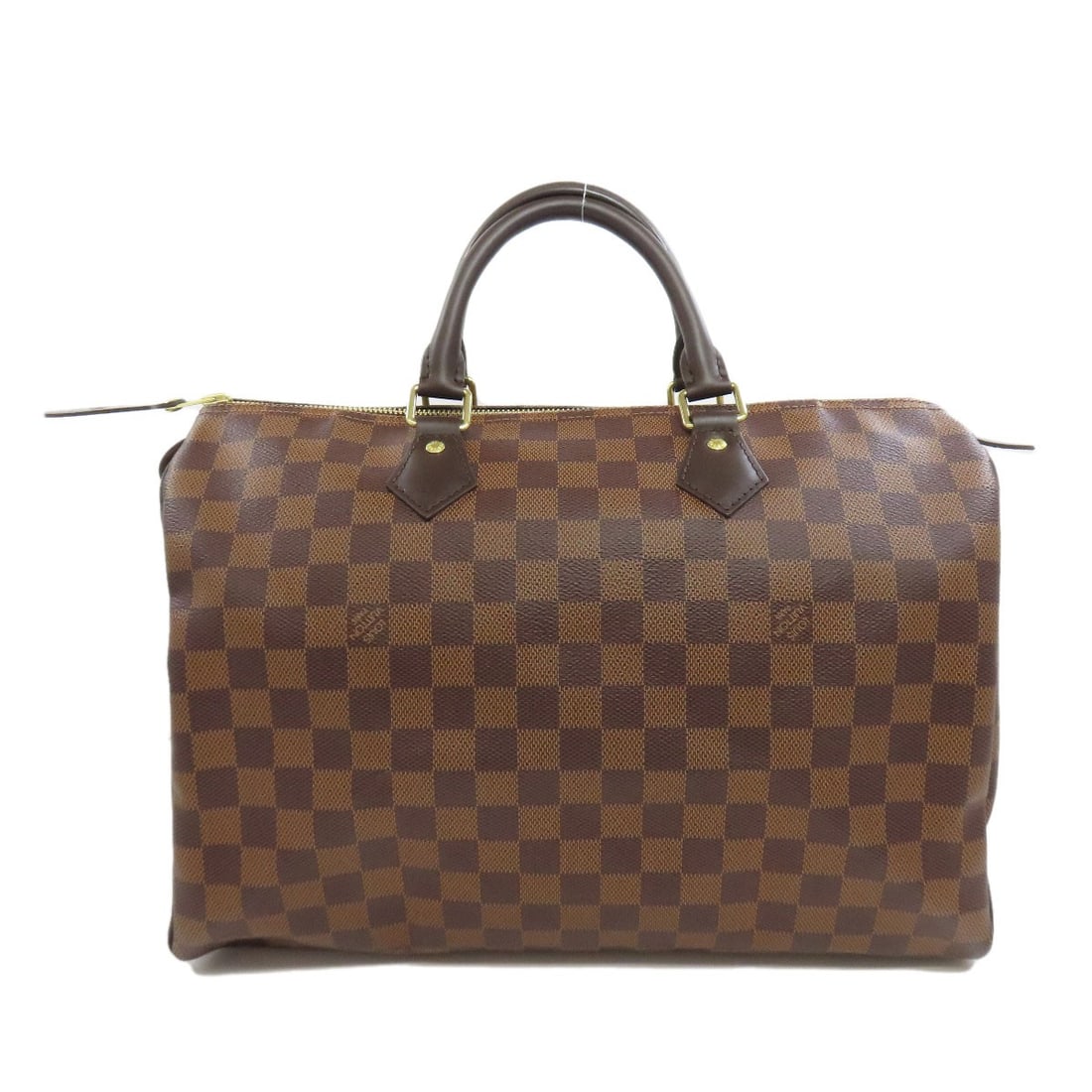 Louis Vuitton Speedy 35 Boston Bag in Damier Canvas: Louis Vuitton Speedy 35 Boston Bag in Damier Canvas The iconic Louis Vuitton Speedy 35 Boston Bag is a timeless classic, boasting the signature Damier canvas exterior in Ebene and adorned with the bra