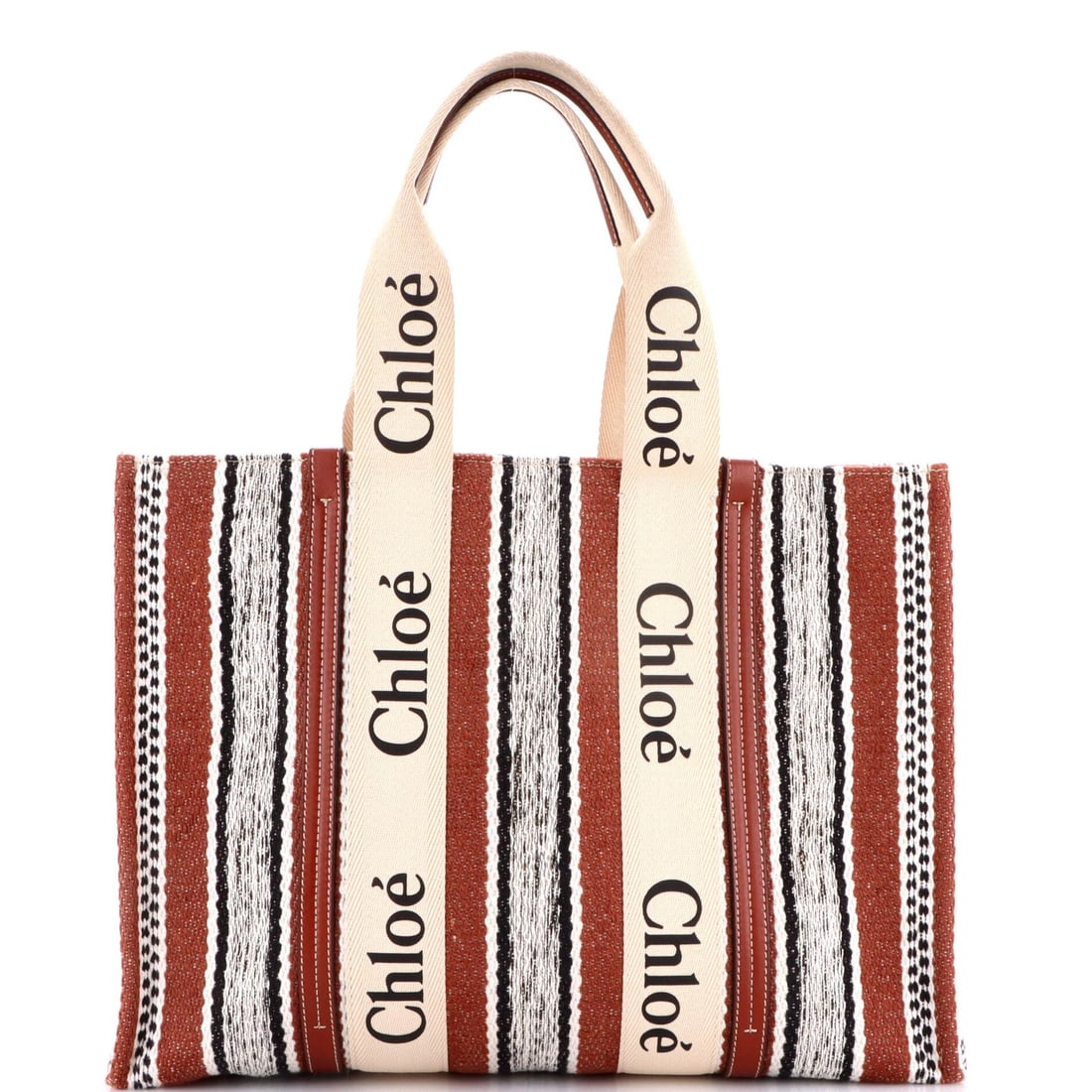 Chloe Large Striped Linen Tote: Chloe Large Striped Linen Tote Experience the effortless chic of Chloe's iconic striped linen tote, perfect for everyday errands and weekend getaways. With its neutral exterior and spacious interior,
