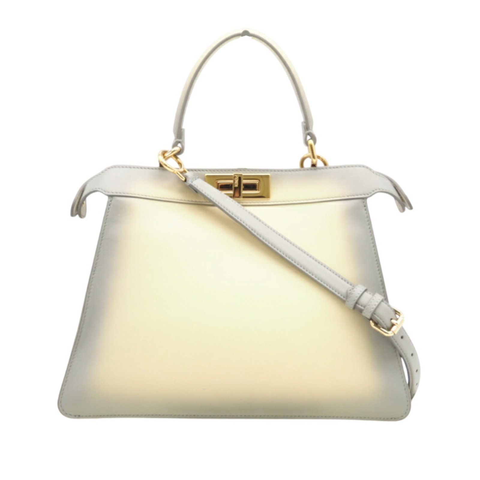 Fendi Shoulder Bag in Leather: Fendi Shoulder Bag in Leather Elevate your style with this pre-loved Fendi shoulder bag, crafted from rich leather in a timeless cream and gray hue. With its classic design and spacious interior,