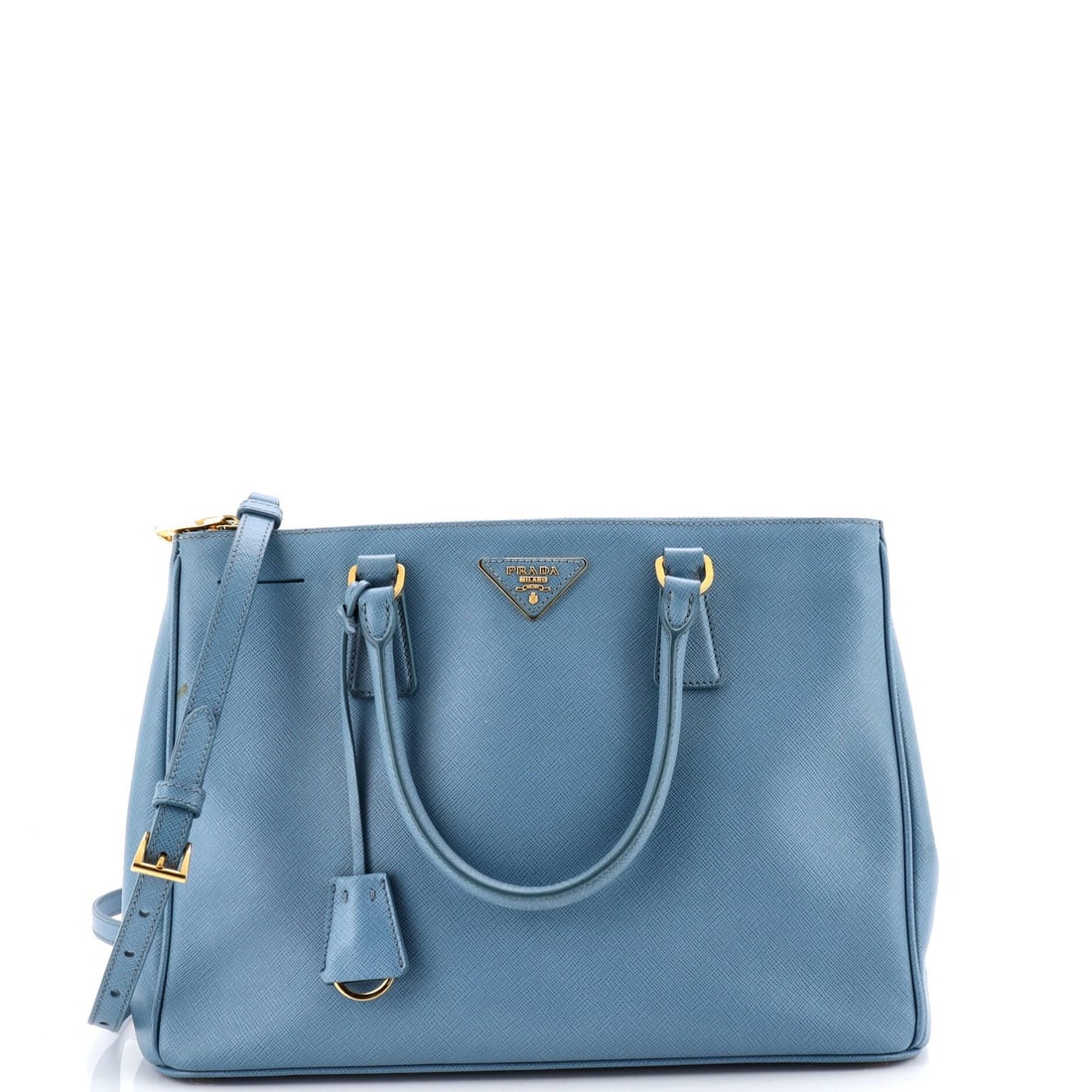 Prada Double Zip Lux Saffiano Leather Medium Tote: Prada Double Zip Lux Saffiano Leather Medium Tote Experience the timeless elegance of Prada's Double Zip Lux Saffiano Leather Medium Tote, boasting a sleek blue exterior and gold hardware that adds a