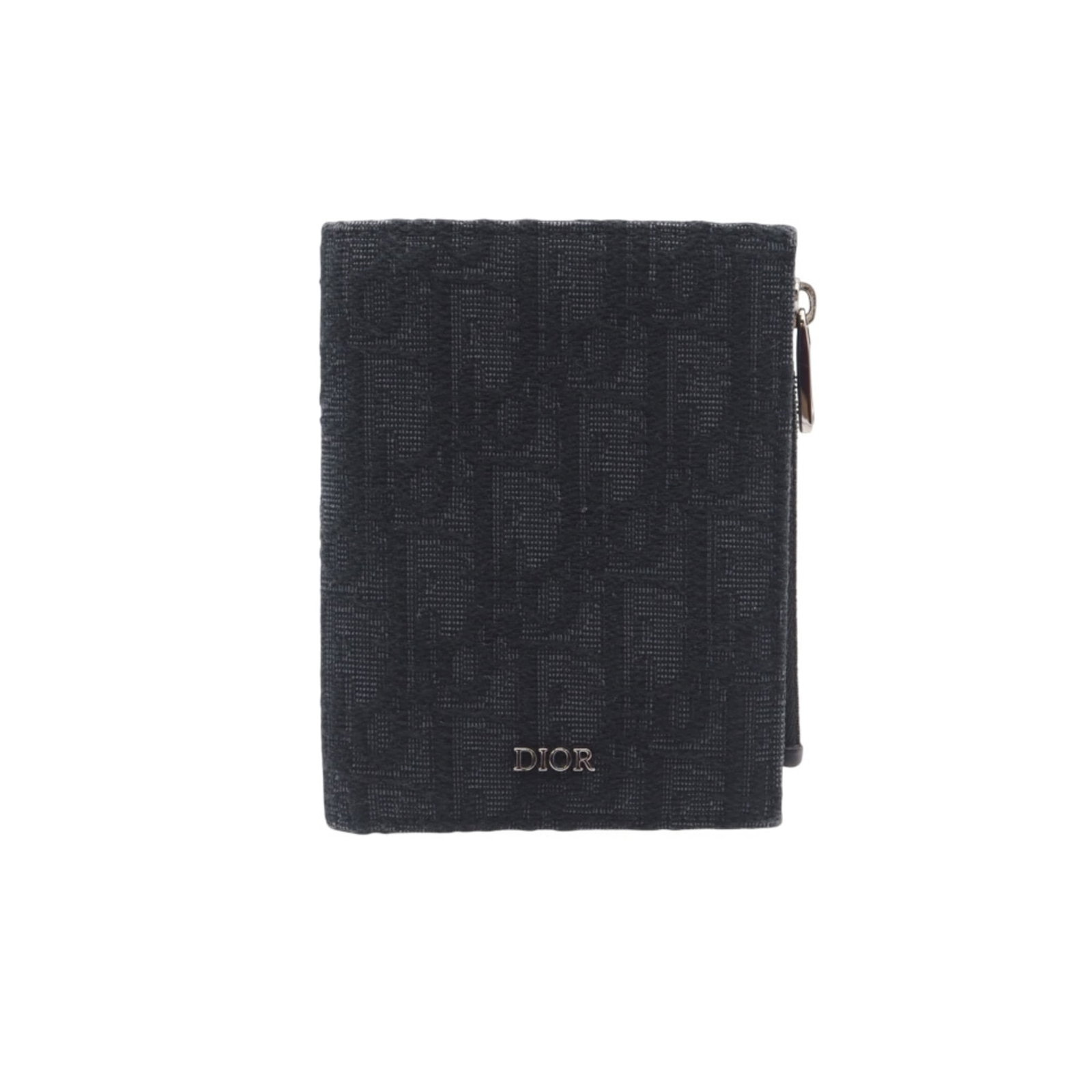 Christian Dior Bi-Fold Canvas and Leather Wallet: Christian Dior Bi-Fold Canvas and Leather Wallet A sleek and sophisticated accessory for the modern gentleman, this Christian Dior bi-fold wallet boasts a striking canvas and leather design in classic