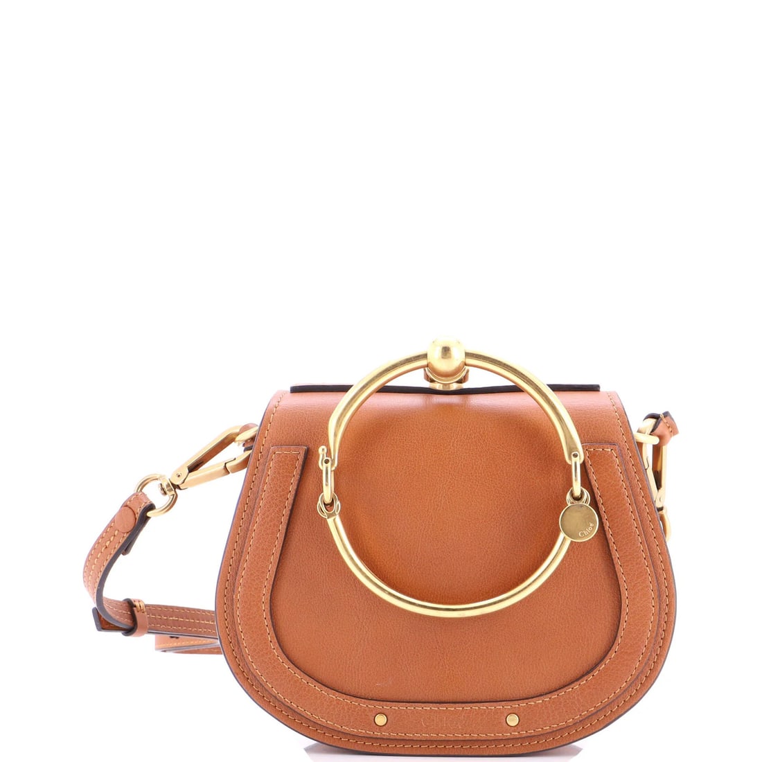 Chloe Nile Small Leather Crossbody Bag: Chloe Nile Small Leather Crossbody Bag The Chloe Nile Small Leather Crossbody Bag is a timeless and sophisticated accessory, boasting sleek brown leather exterior with subtle scuffs and discoloration