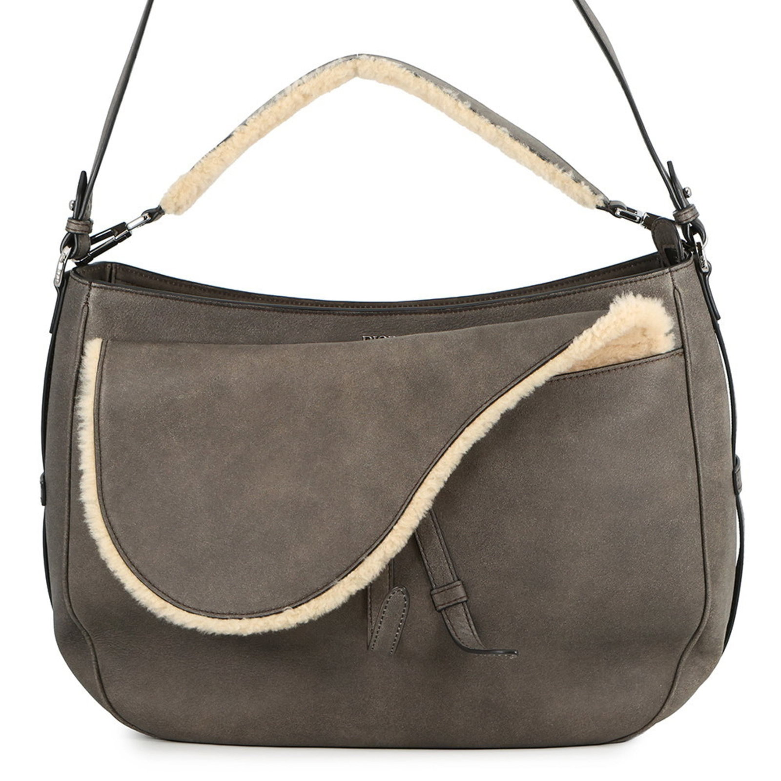 Christian Dior Shoulder Bag in Leather: Christian Dior Shoulder Bag in Leather A timeless piece from the iconic Christian Dior brand, this luxurious Mouton leather shoulder bag boasts a rich brown hue and sleek design, perfect for adding a